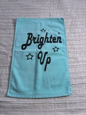 Brighten Up Aqua turquoise coloured hand Towel. EUC. Cute!